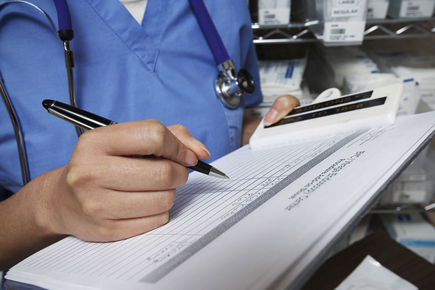 Nurse with a patient's chart